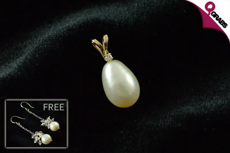 For QR325 get a Classy Gold Pearl Pendant with a 0.015 carat Diamond plus a FREE pair of Pearl Earrings! (QR1,300 Value)